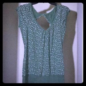 Green blouse with small white flowers printed